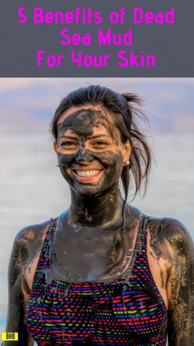 Woman covered in mud at the dead sea