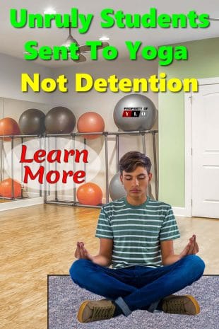 Male Student in Yoga Room using Meditation Pose