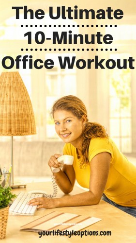 Woman drinking coffee at her desk